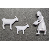 1:48 - Jeune fille nourrissant des chèvres