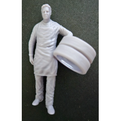 1:24 - Mechanic carrying tires