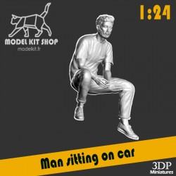 1:24 - Man sitting in a car