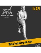 1:24 - Man leaning on car
