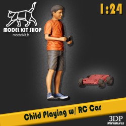 1:24 - Child playing with a remote control car